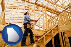 georgia map icon and a custom home builder reviewing construction plans