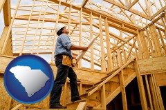south-carolina map icon and a custom home builder reviewing construction plans